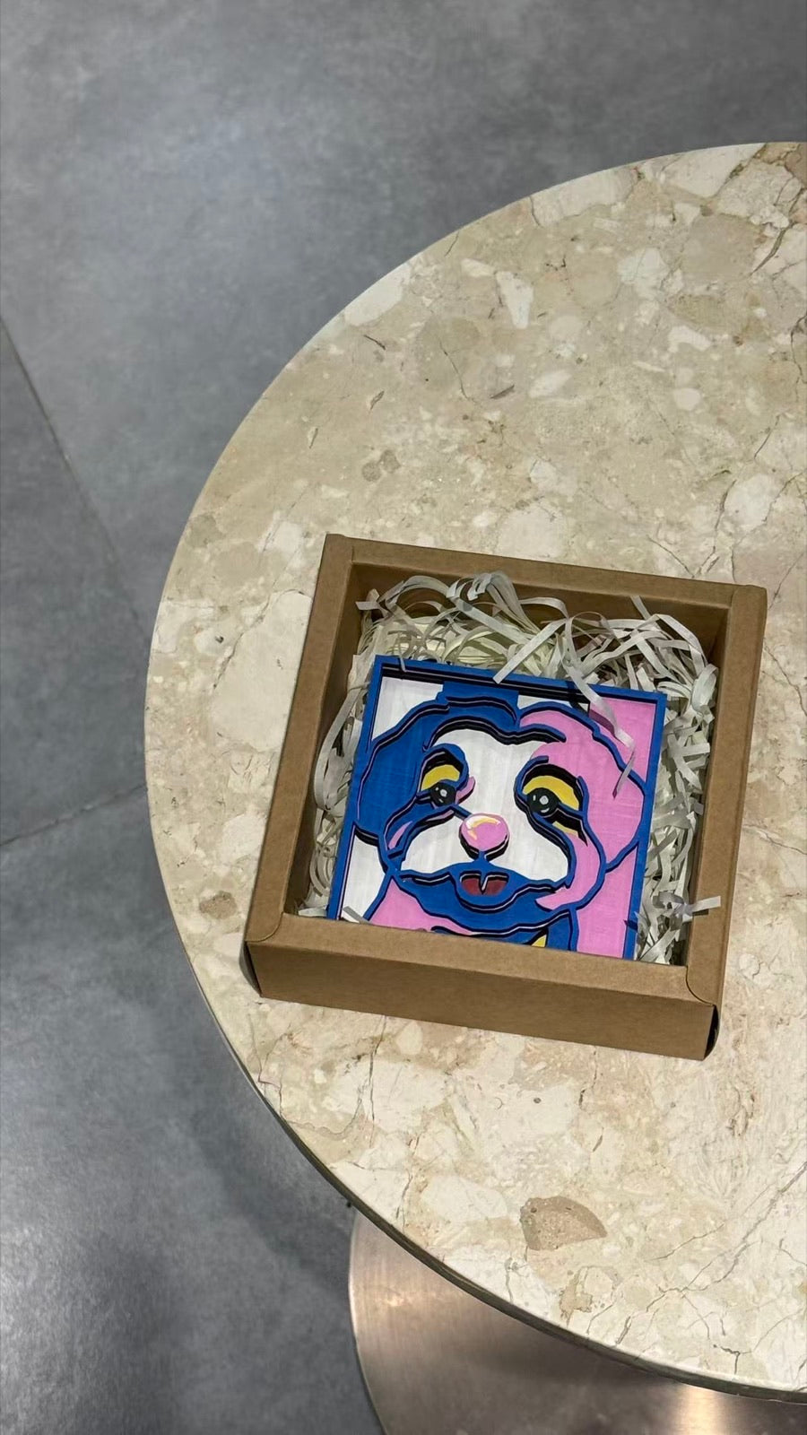 Gift box unboxing with a carnival portrait inside